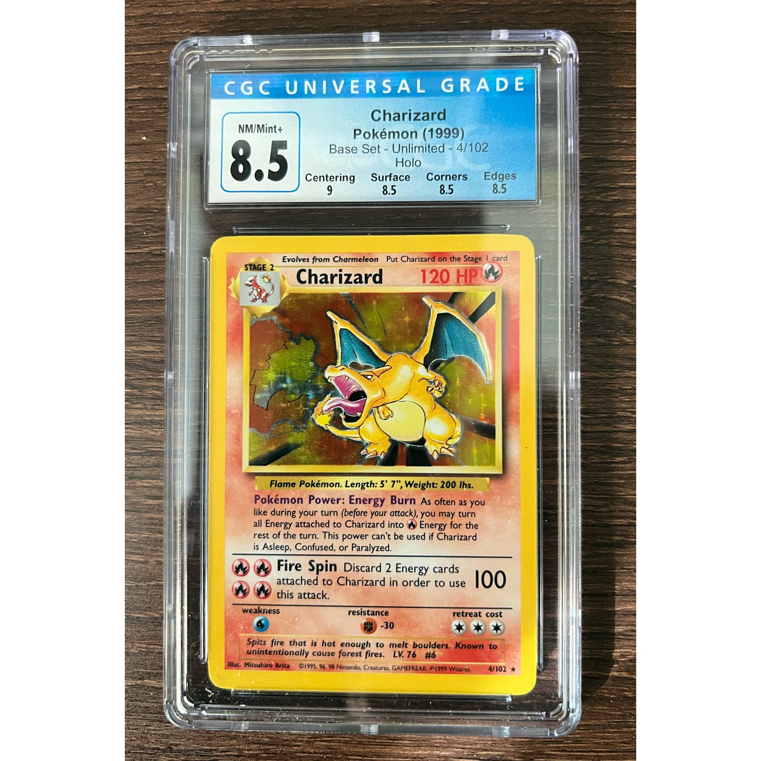 CHARIZARD HOLO Base Set Unlimited #4/102 Graded CGC 8.5 Pokemon Tradin | Display Geek, Inc. CHARIZARD HOLO Base Set Unlimited #4/102 Graded CGC 8.5 Pokemon Tradin | Display Geek, Inc.